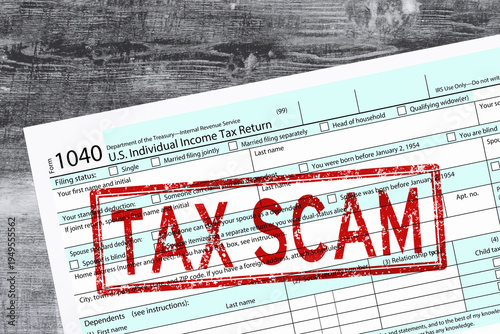 Tax scam warning on 1040 tax form concept