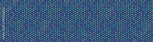 Subtle yet striking, this repeating pattern features tiny, multicolored dots on a deep blue background.