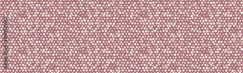 Elegant mauve background adorned with a delicate scattering of offwhite dots, creating a subtle yet sophisticated textured effect.