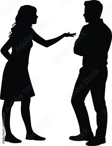 Silhouette of a young woman gesturing and talking to a man with crossed arms during an argument or serious relationship discussion