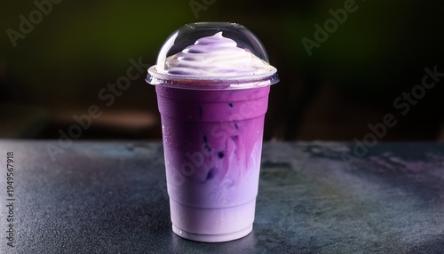 Takeaway Cup Filled With Iced Purple Ube Taro Latte Featuring Milk Swirl