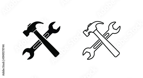 Hammer and wrench crossed black and white icon set illustration