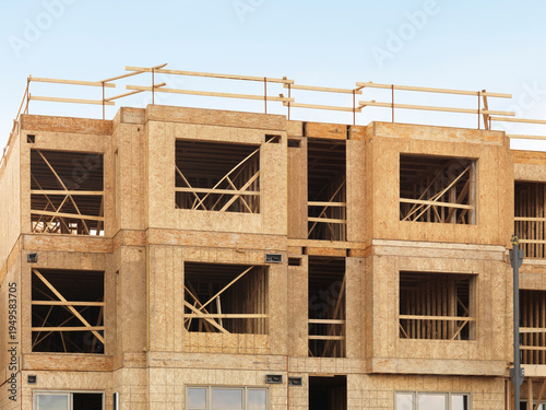 Construction Site Wooden frame residential condo houses being built