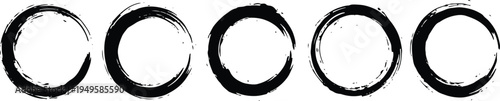 Set of five black ink brush stroke circles on white background for design and decoration purposes  various sizes and shapes