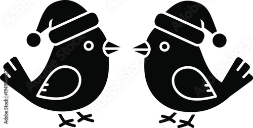Two cute black birds wearing Santa hats, ready for Christmas celebration.