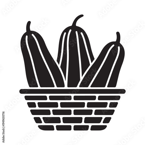 A simple black silhouette of gourds in a woven basket