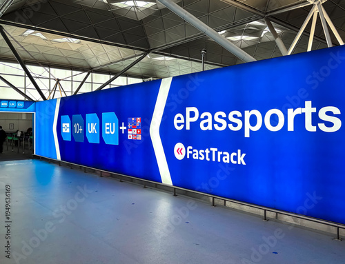 Blue ePassports FastTrack Sign in Airport Terminal for Seamless Travel