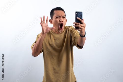 Man in Shock Takes Selfie on White Background