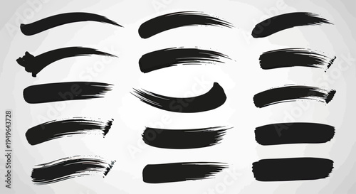 Collection of various black ink brush strokes and paint smears.