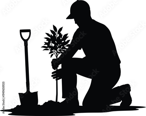 Gardener silhouette kneels to plant a young sapling next to a shovel, suggesting reforestation efforts.