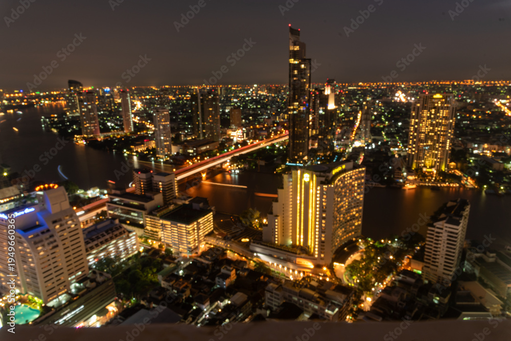 Obraz premium City twilight Amazing cityscape light. Panorama view of Bangkok city skyline night time sunset sky. Beautiful skyscraper midtown landscape. Capital building background modern office district