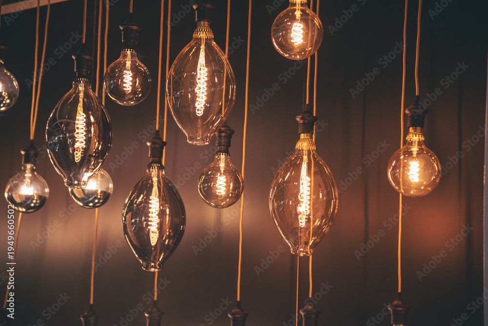 Obraz premium Background light bulb blurry background interior design bar table chair windows with copy space. Blurred background cafe coffee shop restaurant in shopping mall with light bokeh business event