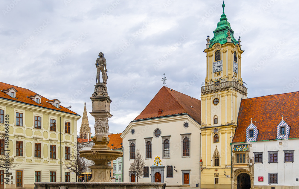 Fototapeta premium Michaels Gate Bratislava Old Town street view with pedestrians and tower