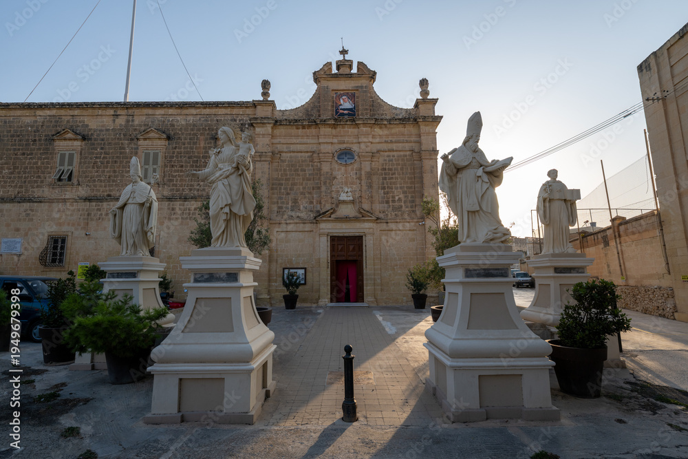 Fototapeta premium Church of St Augustine facade and statues - Rabat, Malta