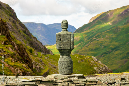A human like figure, built from from slate,overlooking the Honister Pass,Cumbria,Lake District,England,UK.