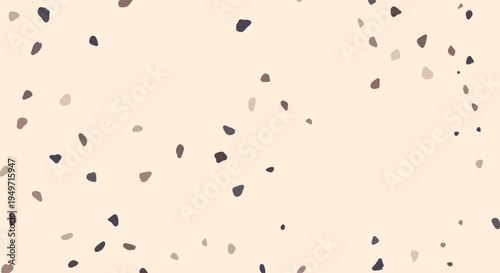 Elegant terrazzo stone texture pattern featuring various brown and black stone chips on a light cream background for interior design.