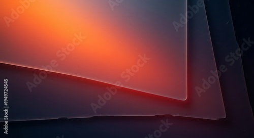 An orange and red glass plate on a dark surface