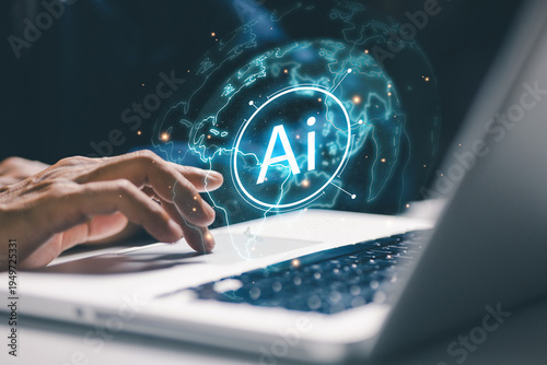 Business professional using laptop with holographic AI interface and global data network visualization. Concept of artificial intelligence innovation, smart automation, data processing