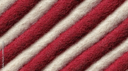 Seamless wool felt texture with red and white diagonal stripes at 45 degree angle, equal width and spacing, soft matte surface, cozy handcrafted fabric, detailed top-down view