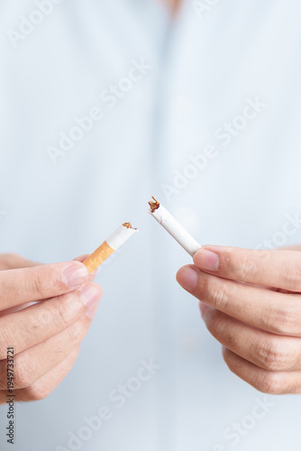 Bild auf Leinwand Man hand break cigarette for World No Tobacco Day concept, quitting smoking to prevent Lung Cancer, COPD, Emphysema and Tuberculosis disease