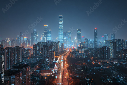 Wallpaper Mural Downtown skyline at night with glowing skyscraper lights and busy city street illuminated by streetlights creating vibrant urban atmosphere full of energy and life Torontodigital.ca