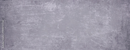 Gray background with a textured, grunge style. The background features a rough, gray surface with a weathered appearance. Rough concrete texture background. Purple background vector.