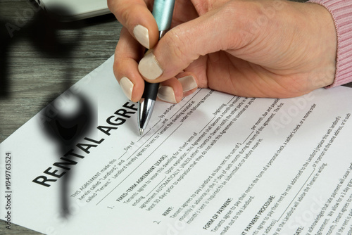 Signing a rental agreement and the keys to an apartment