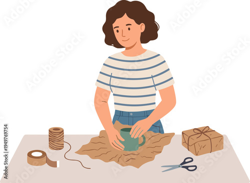 Woman wrapping gifts on table with paper and tape