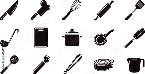 Collection of essential kitchen tools and utensils for culinary preparation