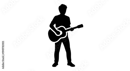Man playing acoustic guitar standing still.