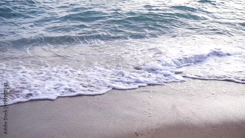 Close up shot of sea surf at beach