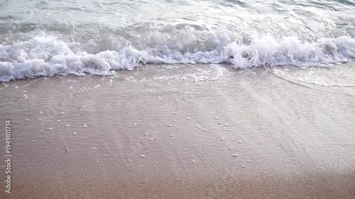 Close up shot of sea surf at beach