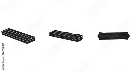 Three black charcoal sticks for drawing and art isolated on white background