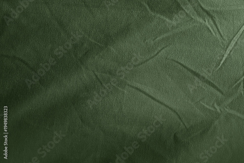 Detail neutral dark forest eco friendly  environmental green tone color comfy natural organic material wrinkled bed sheet texture 