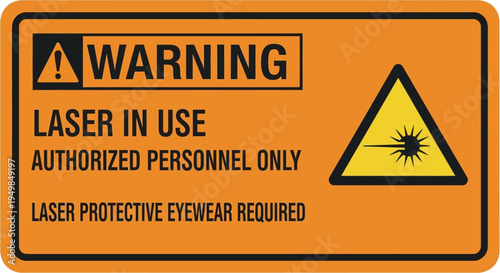 Warning sign with laser triangle symbol indicates authorized personnel only area