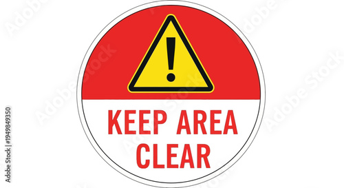 A warning sign displays a yellow triangle on a red background with Keep Area Clear text on a white section.
