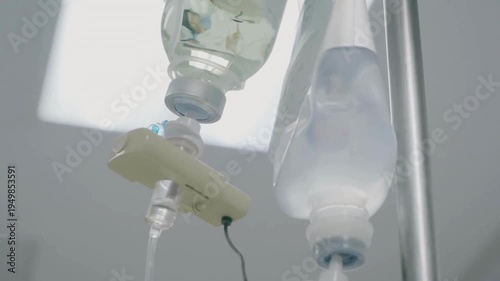 background Closeup of IV drip in hospital for treating patients in the hospital Concept of healthcare Saline IV drip dropper to a operation healthcare