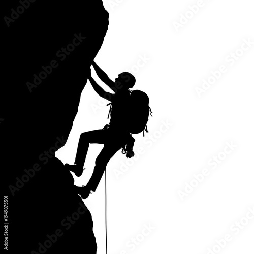 Silhouette of a rock climber ascending.