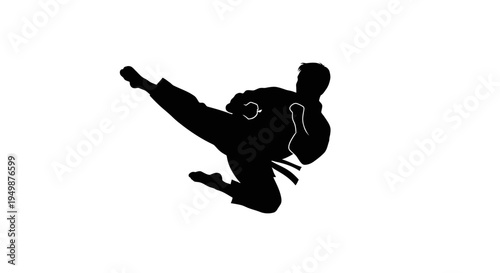 Young woman in dynamic kick pose.