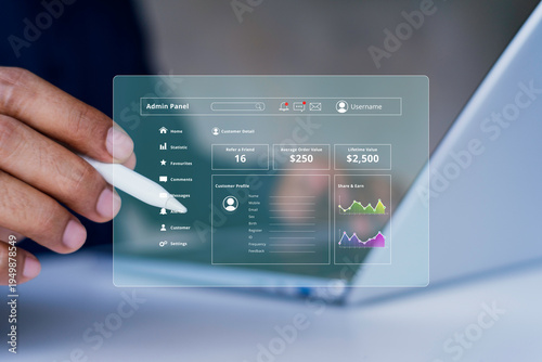 Business analytics dashboard interface on virtual screen with stylus pen, admin panel UI showing customer profile, KPI metrics, statistics and data visualization for digital management platform