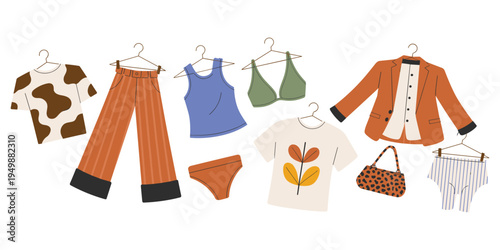 Flat lay of trendy casual adult clothing items on hangers and a handbag fashion apparel