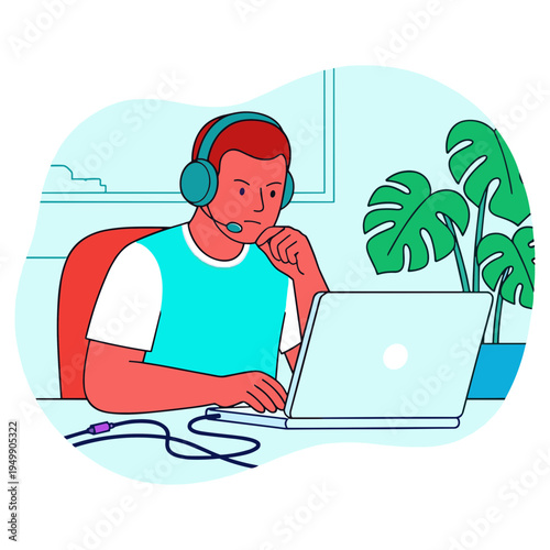 Man wearing headset working on laptop with plant on desk indoors