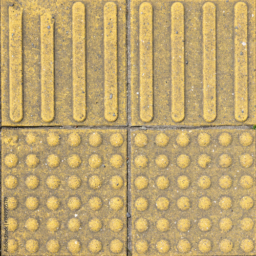 Yellow tactile paving tiles for visually impaired people