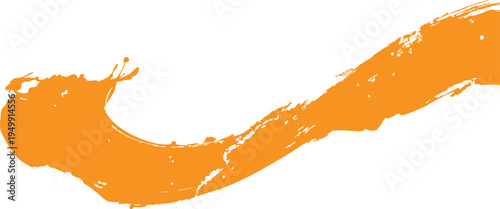 Orange paint brush stroke on white background for graphic design and artistic projects