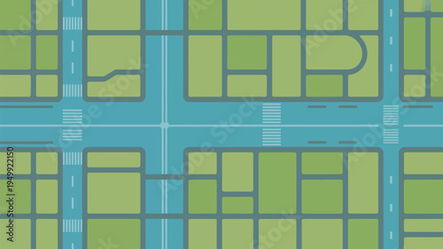 An aerial view of a planned city with green spaces and roads