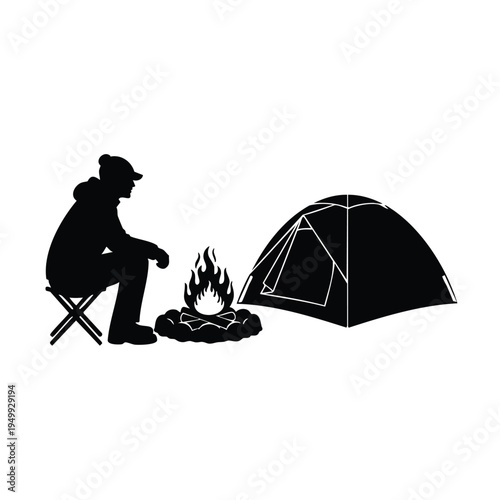 Silhouette man sitting on stool near campfire and camping tent outdoor
