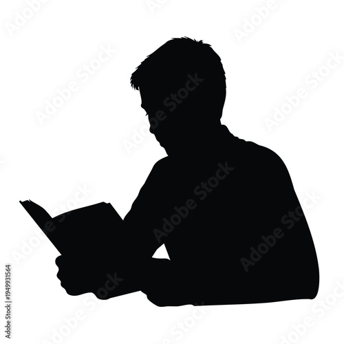 Silhouette of man reading book sitting at table quiet study time concentrated