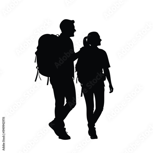 Young couple on a backpacking trip, full silhouette of hikers outdoor