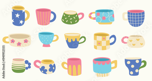 Ceramic colorful mugs and cups. Decorated home crockery. Kitchen mugs of various shapes.
