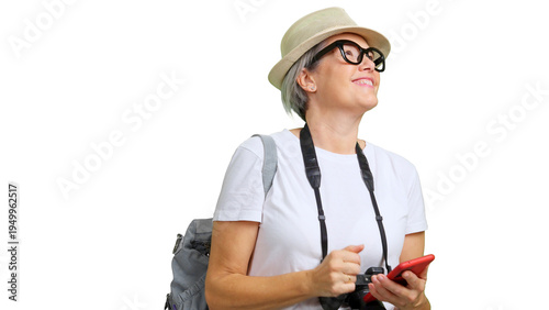 Woman traveling with camera and phone looking away